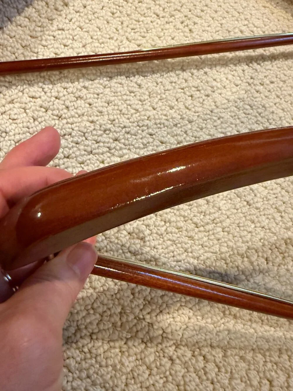 Tom James Wooden Suit Hangers with Bar set of 2, one is thicker than the other.